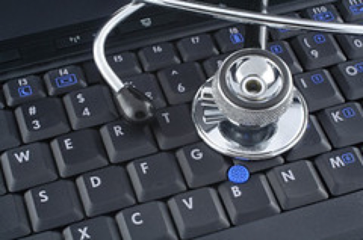 A medical stethoscope on a desk, representing health and indemnity insurance